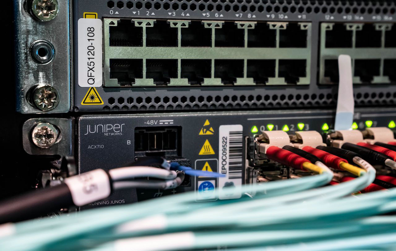 Back view image of the ACX710 Universal Metro Router and network cables