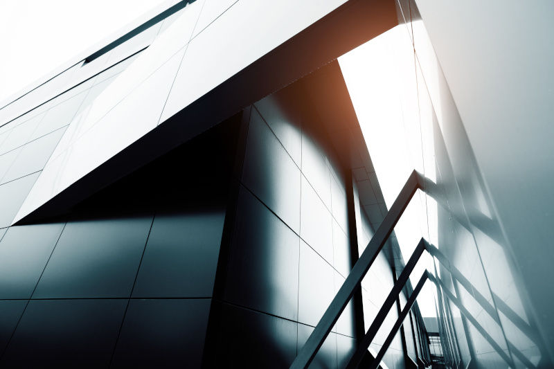 Black and white close-up photograph of modern building walls