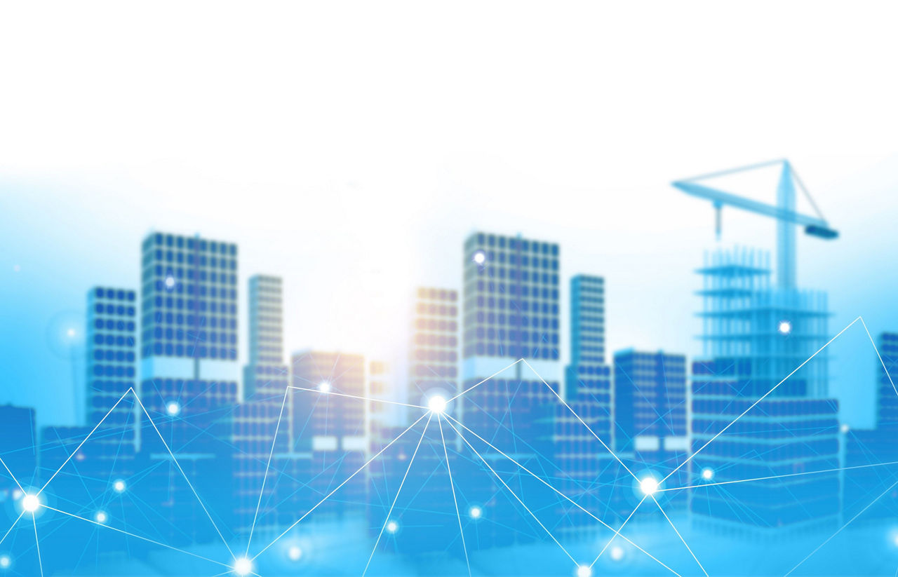 都市の高層ビルと、それぞれに接続されたデータセンターを表す線のグラフィックが表示されています。