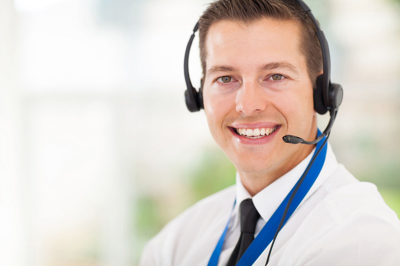 headshot of support specialist with headset