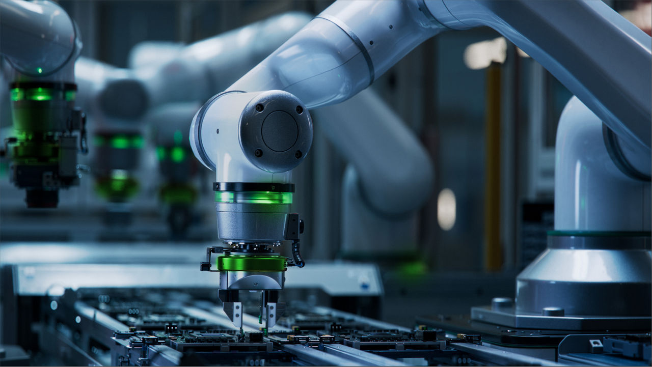 電子部品を組み立てる精密ツールを備えたロボットアームのクローズアップ写真