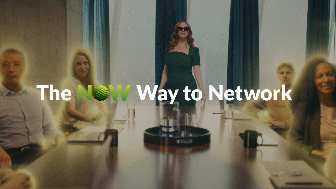 Juniper's Christina Hendrix at the head of a conference table. With the text "The NOW Way to Network" overlayed, with "NOW" emphasizing the "O" in green color.