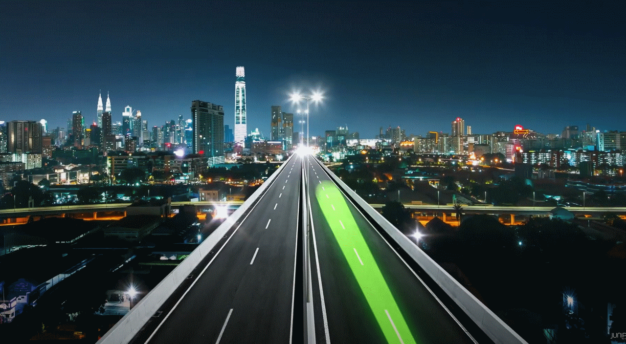 Image of three green connected leaves depicting a sustainable network solution, on a dark background