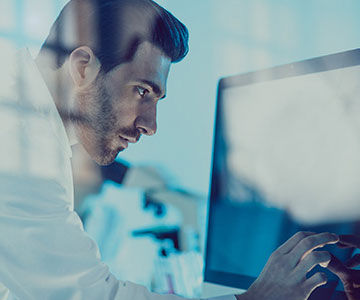 Image of person looking at monitor 