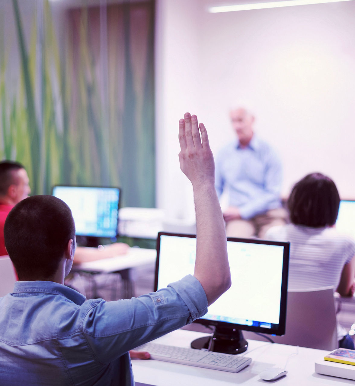 student answering a question in classroom