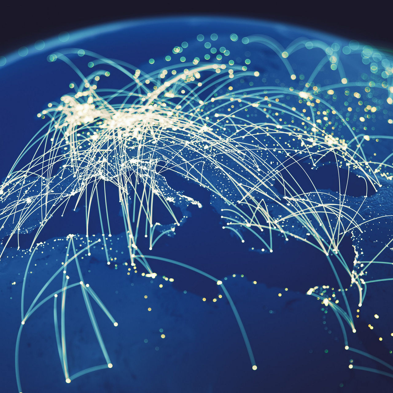 グローバルネットワークコネクションが、映し出された世界地図を指す