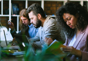 Multiple people working at computers